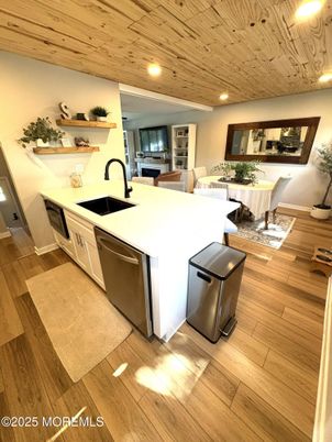 Interior, Kitchen, Living room, Recessed Lighting, Stainless Steel Appliances, Wooden Ceilings, Wood Texture Flooring