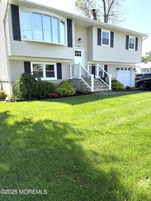 Attached, Backyard, Exterior, Facade, Raised Ranch