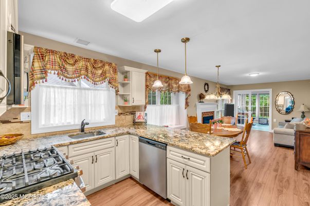 Dining room, Fireplace, Interior, Kitchen, Living room, Pendant Lights, Recessed Lighting, Wood Texture Flooring