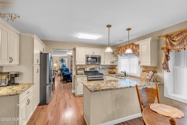 Interior, Kitchen, Pendant Lights, Stainless Steel Appliances, Wood Texture Flooring