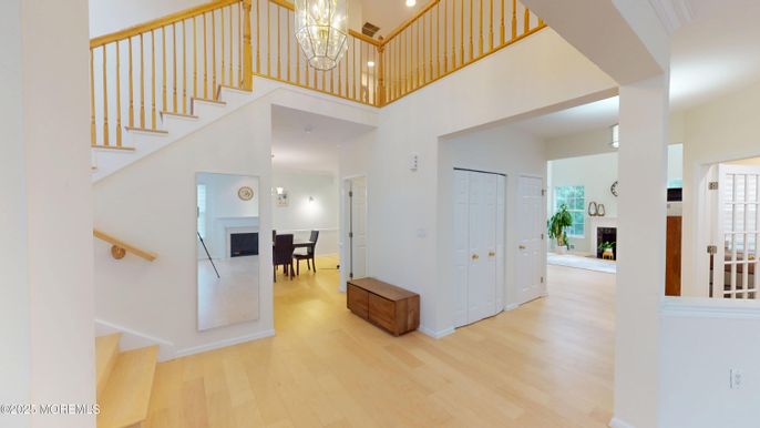 Chandelier, Dining room, Fireplace, Interior, Pendant Lights, Wood Texture Flooring