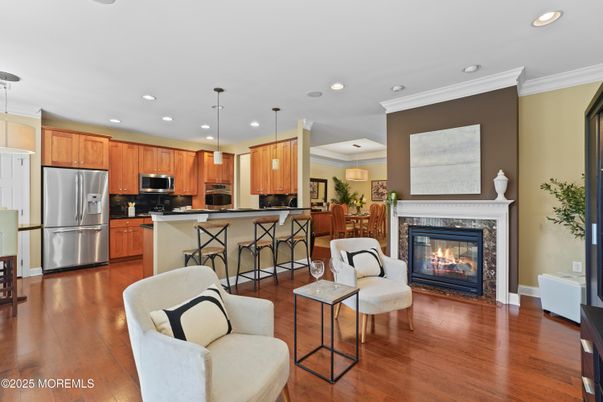 Fireplace, Interior, Kitchen, Pendant Lights, Recessed Lighting, Stainless Steel Appliances, Wood Texture Flooring