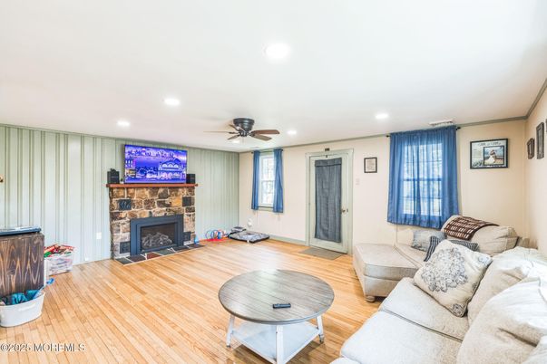 Fireplace, Interior, Living room, Recessed Lighting, Wood Texture Flooring