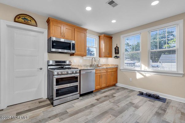 Interior, Kitchen, Recessed Lighting, Stainless Steel Appliances, Wood Texture Flooring