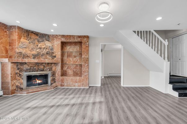 Fireplace, Interior, Pendant Lights, Recessed Lighting, Wood Texture Flooring