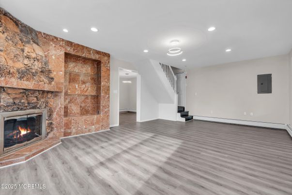 Empty room, Fireplace, Interior, Recessed Lighting, Wood Texture Flooring