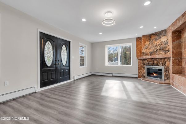 Empty room, Fireplace, Interior, Recessed Lighting, Wood Texture Flooring