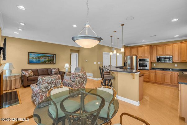 Dining room, Interior, Kitchen, Living room, Pendant Lights, Recessed Lighting, Stainless Steel Appliances, Wood Texture Flooring