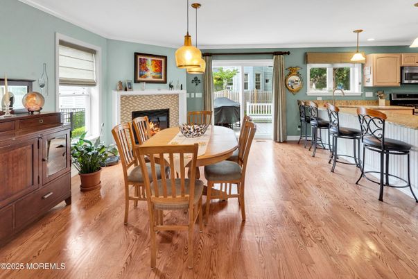 Dining room, Fireplace, Interior, Kitchen, Pendant Lights, Recessed Lighting, Wood Texture Flooring