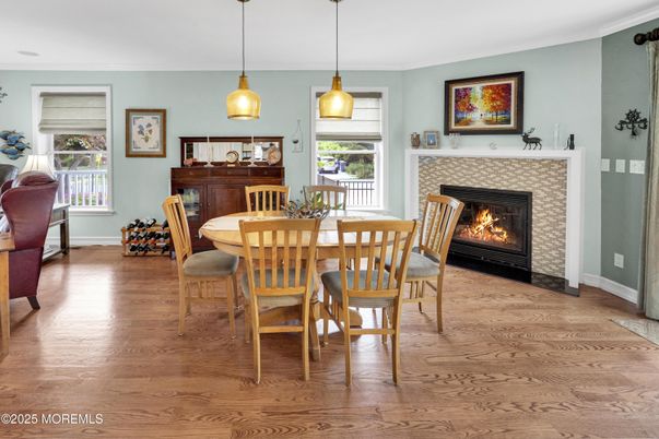 Dining room, Fireplace, Interior, Pendant Lights, Wood Texture Flooring