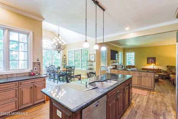 Chandelier, Dining room, Interior, Kitchen, Living room, Pendant Lights, Recessed Lighting, Wood Texture Flooring
