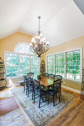 Chandelier, Dining room, Interior, Wood Texture Flooring
