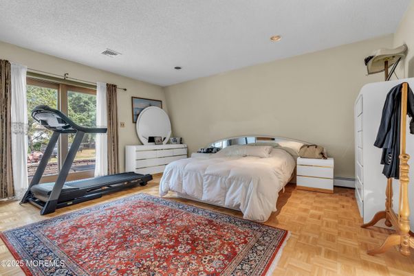 Bedroom, Fitness Equipment, Interior, Recessed Lighting, Wood Texture Flooring