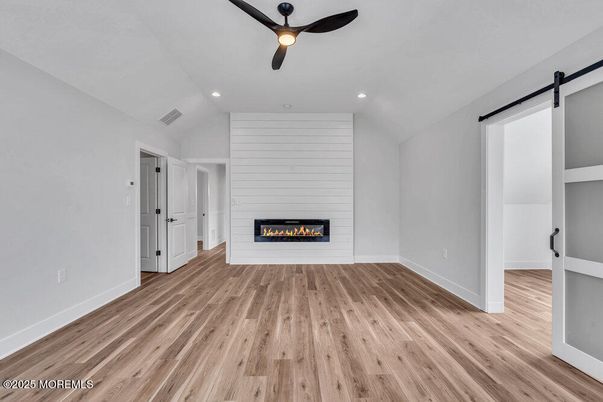 Empty room, Fireplace, Interior, Recessed Lighting, Wood Texture Flooring