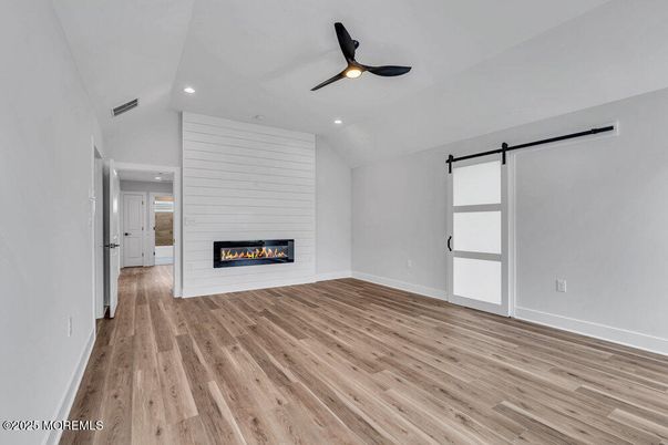 Empty room, Fireplace, Interior, Recessed Lighting, Wood Texture Flooring