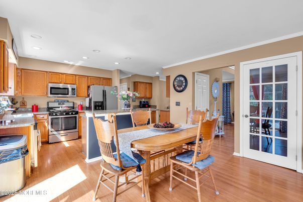 Dining room, Interior, Kitchen, Recessed Lighting, Stainless Steel Appliances, Wood Texture Flooring