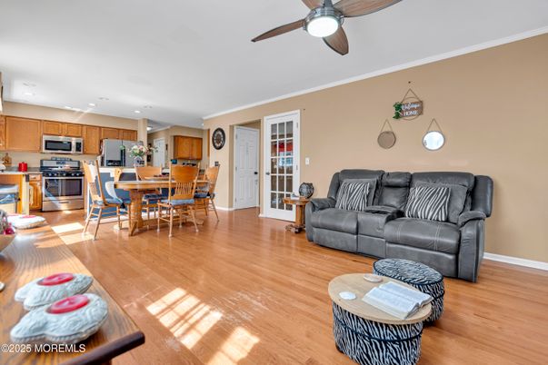Dining room, Interior, Kitchen, Living room, Recessed Lighting, Stainless Steel Appliances, Wood Texture Flooring