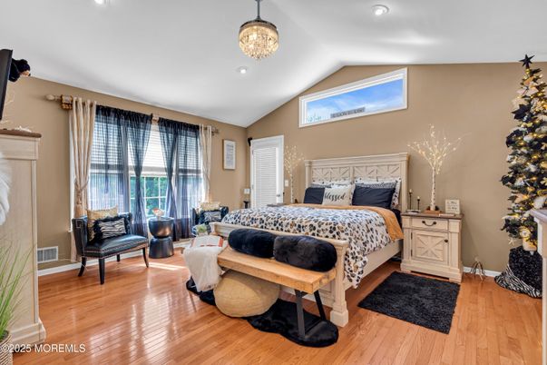 Bedroom, Fireplace, Interior, Pendant Lights, Recessed Lighting, Wood Texture Flooring