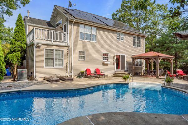 Exterior, Pool, Solar Panels