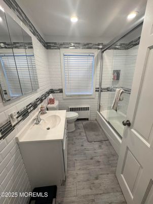 Bathroom, Dual Sink Vanities, Glass Shower, Interior, Recessed Lighting, Wood Texture Flooring