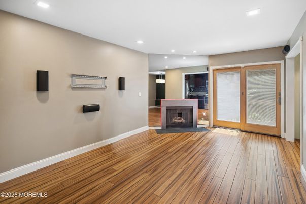 Empty room, Fireplace, Interior, Recessed Lighting, Wood Texture Flooring