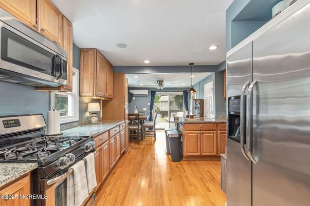 Dining room, Interior, Kitchen, Pendant Lights, Recessed Lighting, Stainless Steel Appliances, Wood Texture Flooring