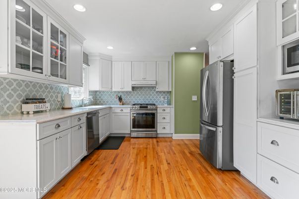 Interior, Kitchen, Recessed Lighting, Stainless Steel Appliances, Wood Texture Flooring