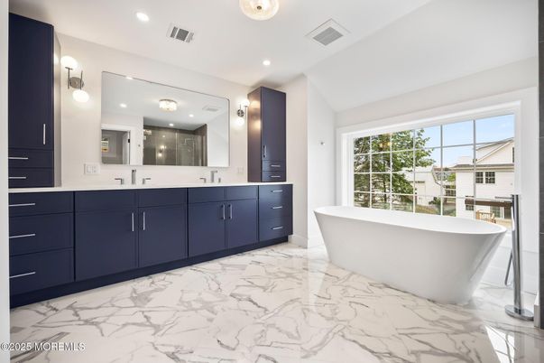 Bathroom, Dual Sink Vanities, Free Standing Baths, Interior, Marble, Recessed Lighting