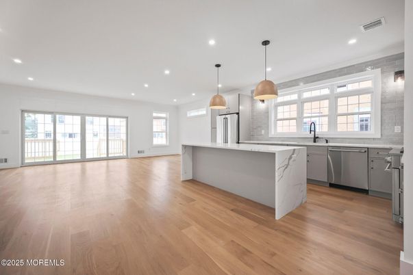 Interior, Kitchen, Pendant Lights, Recessed Lighting, Stainless Steel Appliances, Wood Texture Flooring