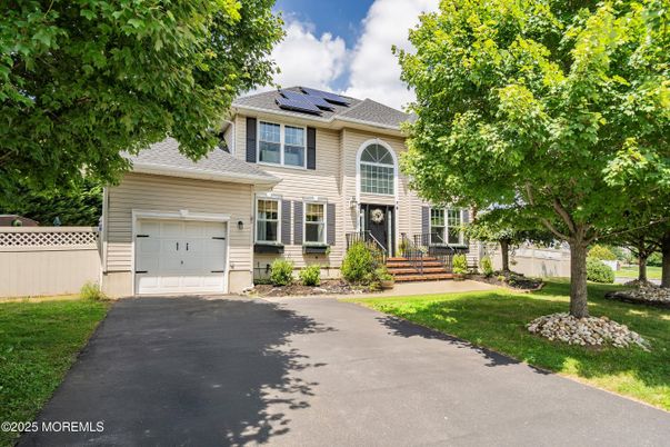 Attached, Exterior, Facade, Solar Panels, French Provincial