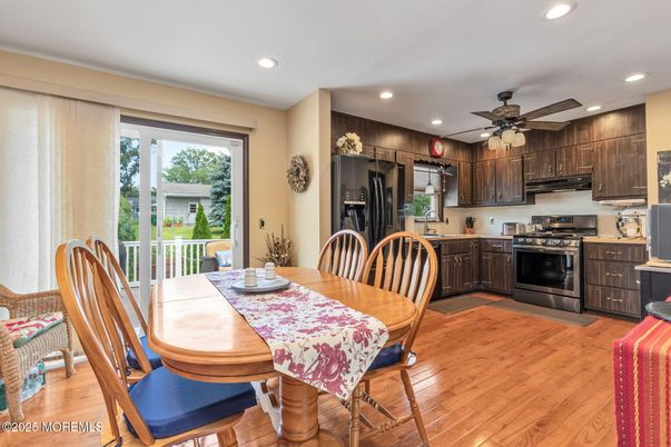 Dining room, Interior, Kitchen, Recessed Lighting, Stainless Steel Appliances, Wood Texture Flooring