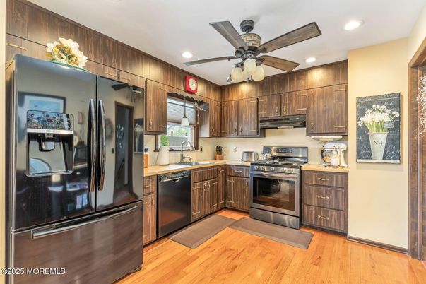 Interior, Kitchen, Recessed Lighting, Stainless Steel Appliances, Wood Texture Flooring