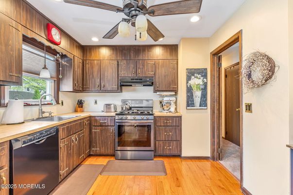 Interior, Kitchen, Recessed Lighting, Stainless Steel Appliances, Wood Texture Flooring