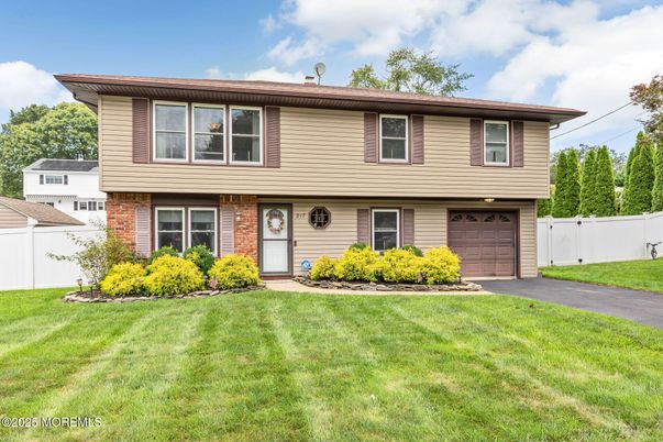 Attached, Exterior, Facade, Brick Facade, Split Level