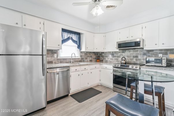 Interior, Kitchen, Stainless Steel Appliances, Wood Texture Flooring