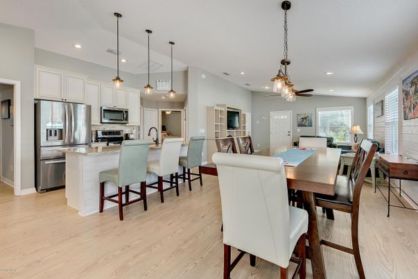 Dining room, Interior, Kitchen, Pendant Lights, Recessed Lighting, Stainless Steel Appliances, Wood Texture Flooring