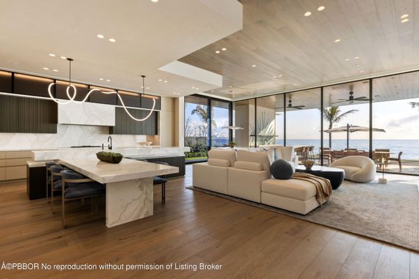 Dining room, Interior, Kitchen, Living room, Marble Walls, Pendant Lights, Recessed Lighting, Water, Wood Texture Flooring
