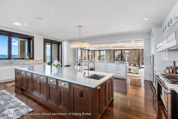 Chandelier, Interior, Kitchen, Pendant Lights, Recessed Lighting, Stainless Steel Appliances, Water, Wood Texture Flooring