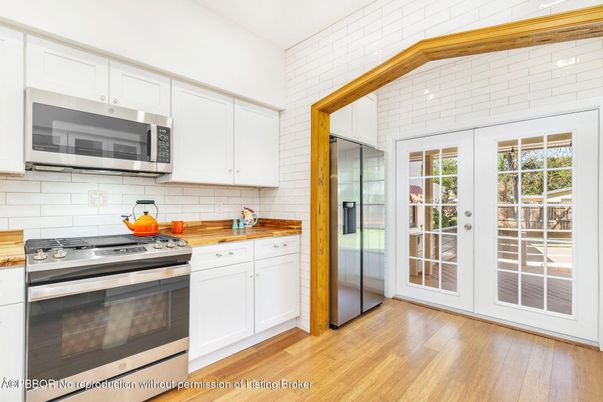 Interior, Kitchen, Stainless Steel Appliances, Stone Walls, Wooden Beams, Wood Texture Flooring