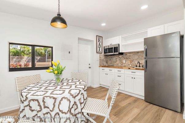 Dining room, Interior, Kitchen, Pendant Lights, Recessed Lighting, Stainless Steel Appliances, Wood Texture Flooring