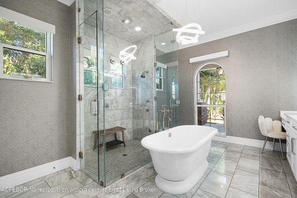 Bathroom, Free Standing Baths, Glass Shower, Interior, Marble, Marble Walls, Pendant Lights, Recessed Lighting