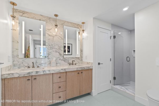 Bathroom, Dual Sink Vanities, Glass Shower, Interior, Marble Walls, Recessed Lighting