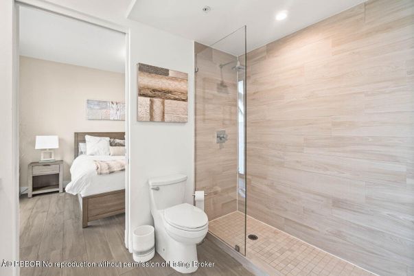 Bathroom, Bedroom, Glass Shower, Interior, Recessed Lighting, Wood Texture Flooring