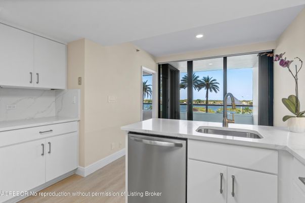 Interior, Kitchen, Marble Walls, Recessed Lighting, Stainless Steel Appliances, Wood Texture Flooring