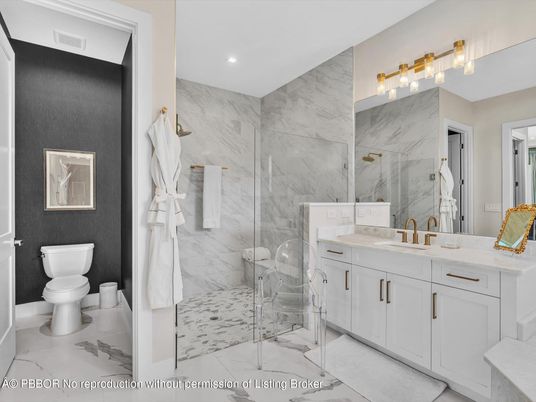 Bathroom, Dual Sink Vanities, Glass Shower, Interior, Marble, Marble Walls, Recessed Lighting