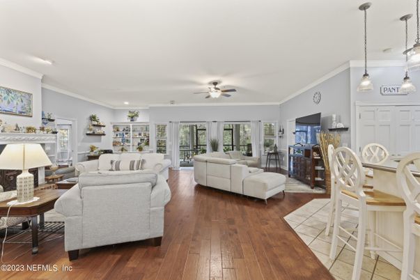 Dining room, Fireplace, Interior, Living room, Pendant Lights, Recessed Lighting, Wood Texture Flooring