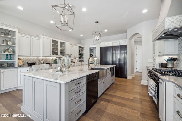 Chandelier, Interior, Kitchen, Pendant Lights, Recessed Lighting, Stainless Steel Appliances, Wood Texture Flooring