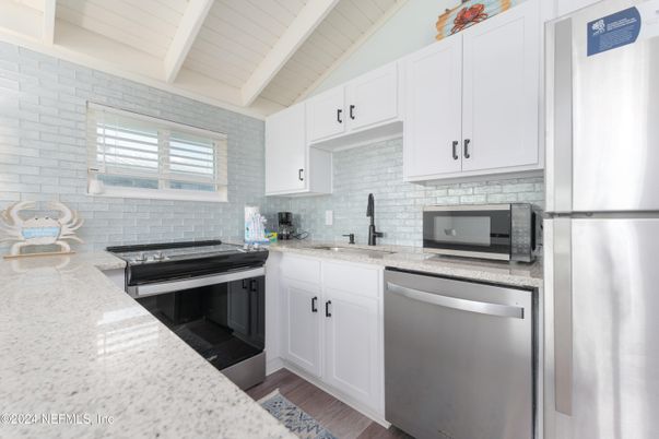 Interior, Kitchen, Stainless Steel Appliances, Stone Walls, Wood Texture Flooring