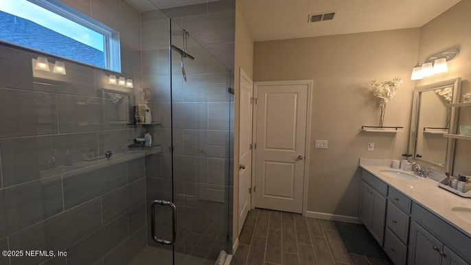 Bathroom, Dual Sink Vanities, Glass Shower, Interior, Wood Texture Flooring