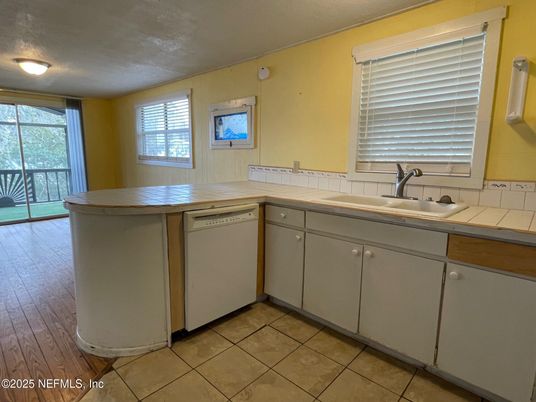 Interior, Kitchen, Tile Countertops, Wood Texture Flooring